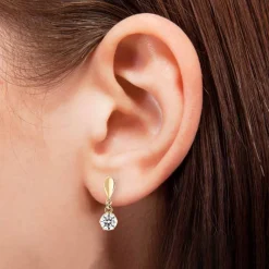 Kultaiset korvakorut 5,5mm kirkkaalla zirkoniakivellä, 14K keltakulta